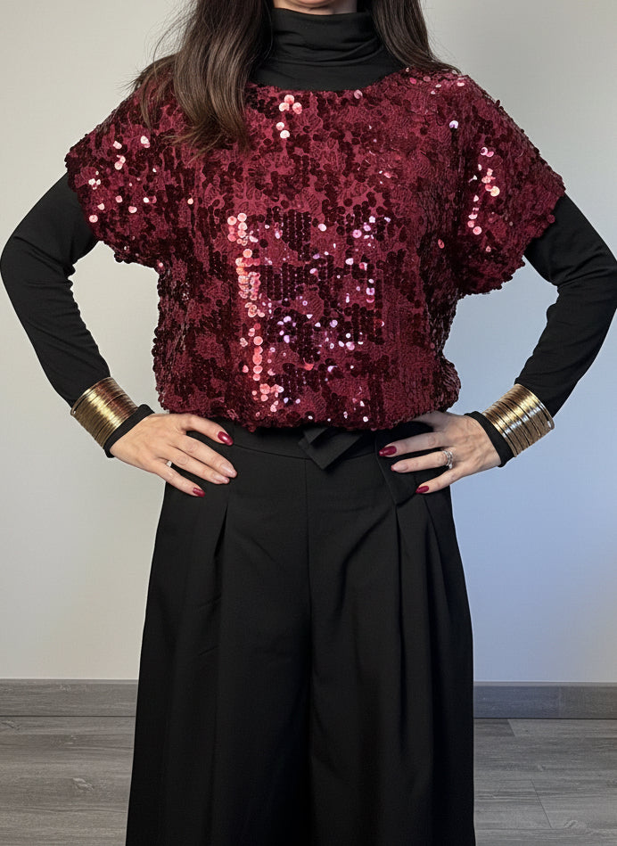 Top paillettes e fiocchi vino